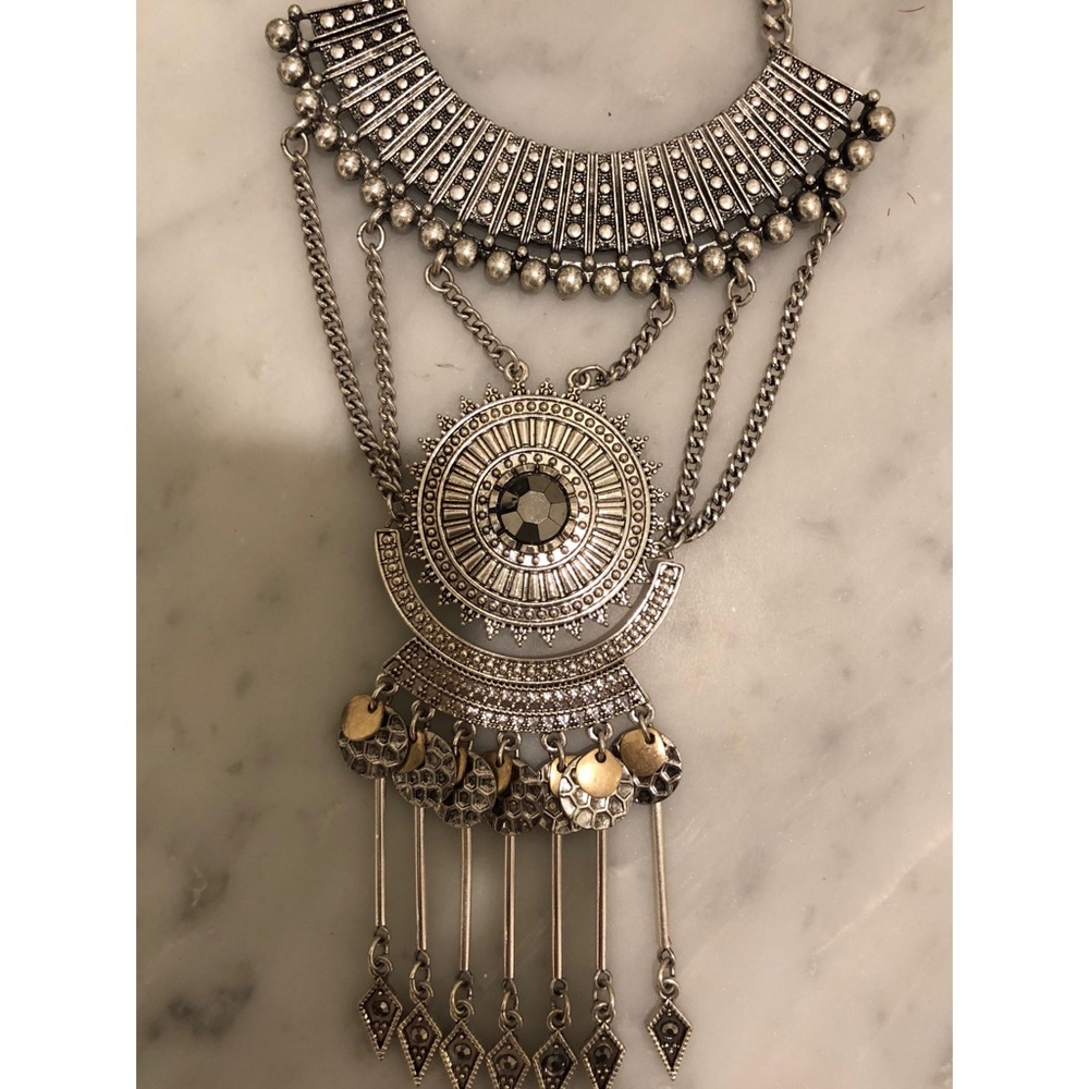 Statement necklace in silver and gold tones